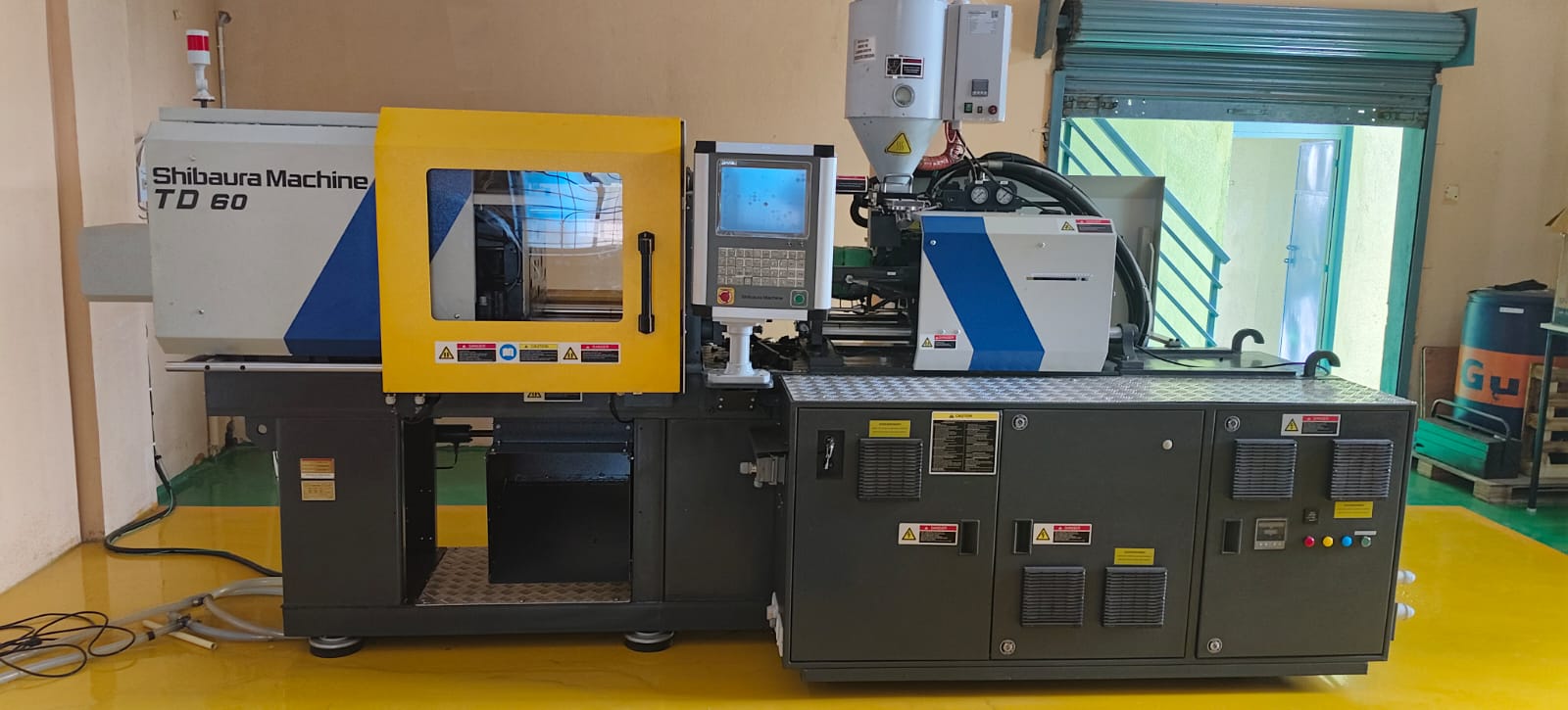 Injection moulding machine in the manufacturing facility